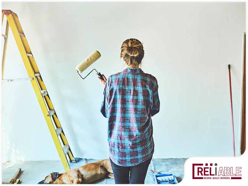 115-reliablerem3 A Woman in a house painting project in Birmingham, AL