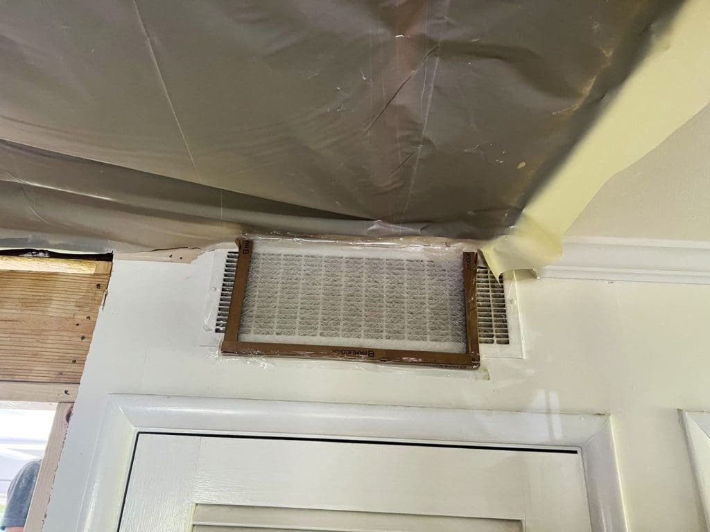 A clogged vent, a sign of poor HVAC Dust Control in a Birmingham, AL project